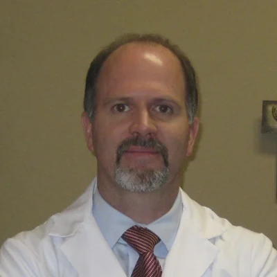 A headshot of Dr. George Hoogeveen, a doctor at RegenRx Medical